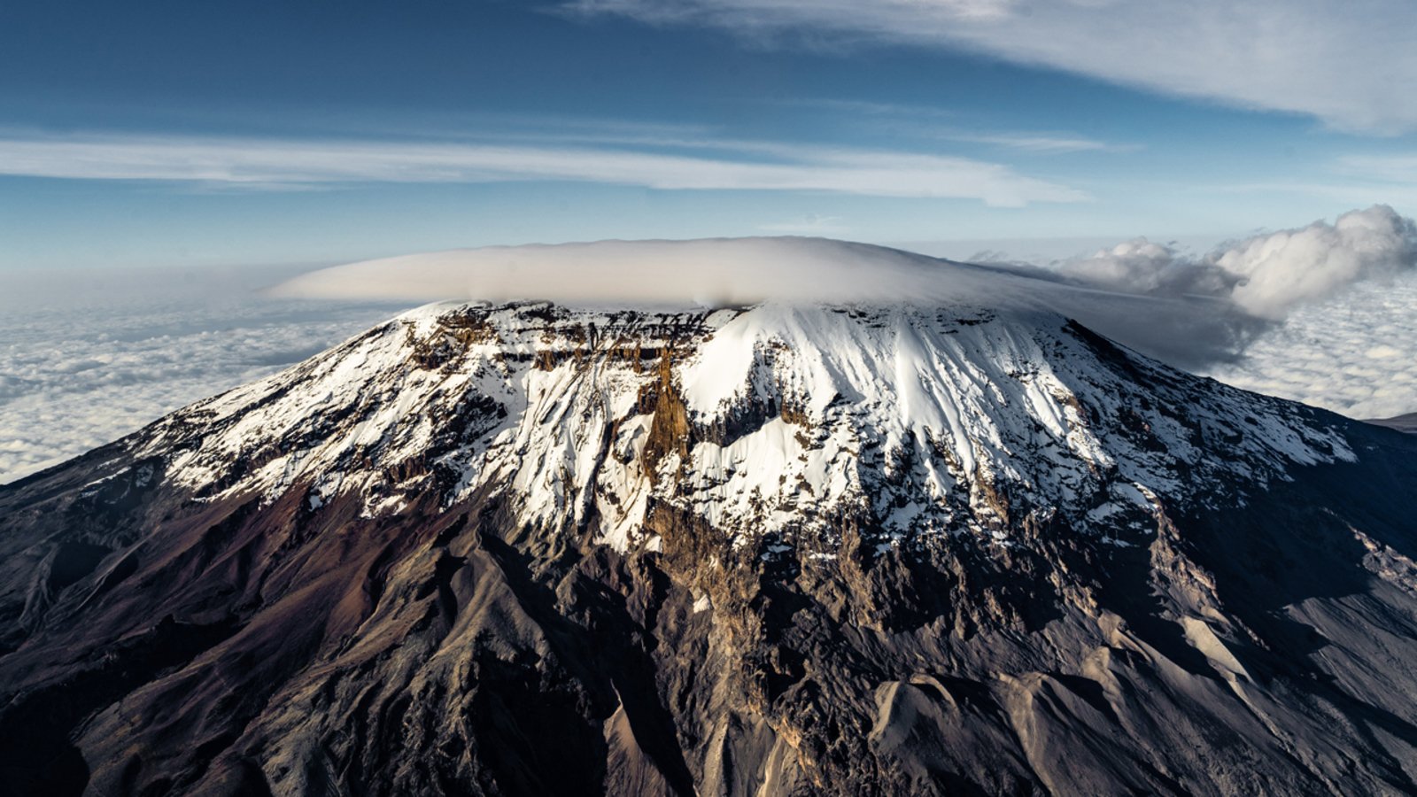 Kilimanjaro Mountain Aerial View during scenic flight; Shutterstock ID 1999605170; purchase_order: WPVI; job: ; client: ; other: